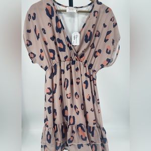 COPY - This adorable leopard print dress is perfect for Spring!